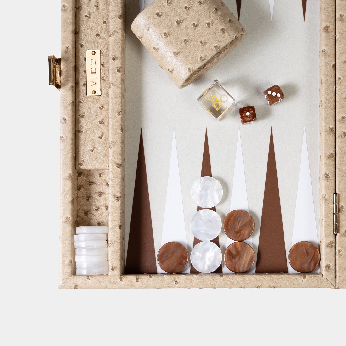 Beige ostrich backgammon with dice and dice cup for decorative piece by VIDO