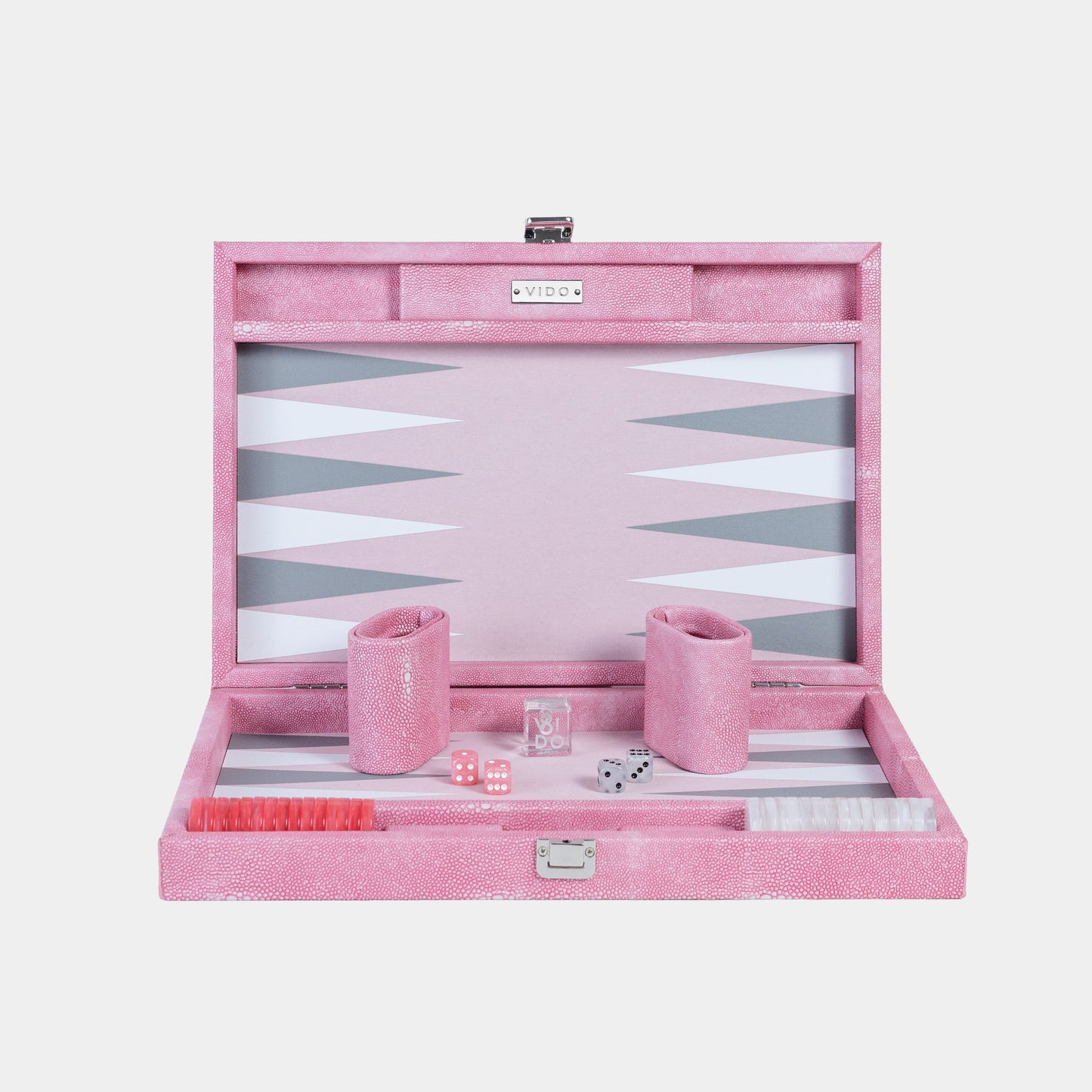 Pink backgammon set with pieces and dice on a white background by VIDO