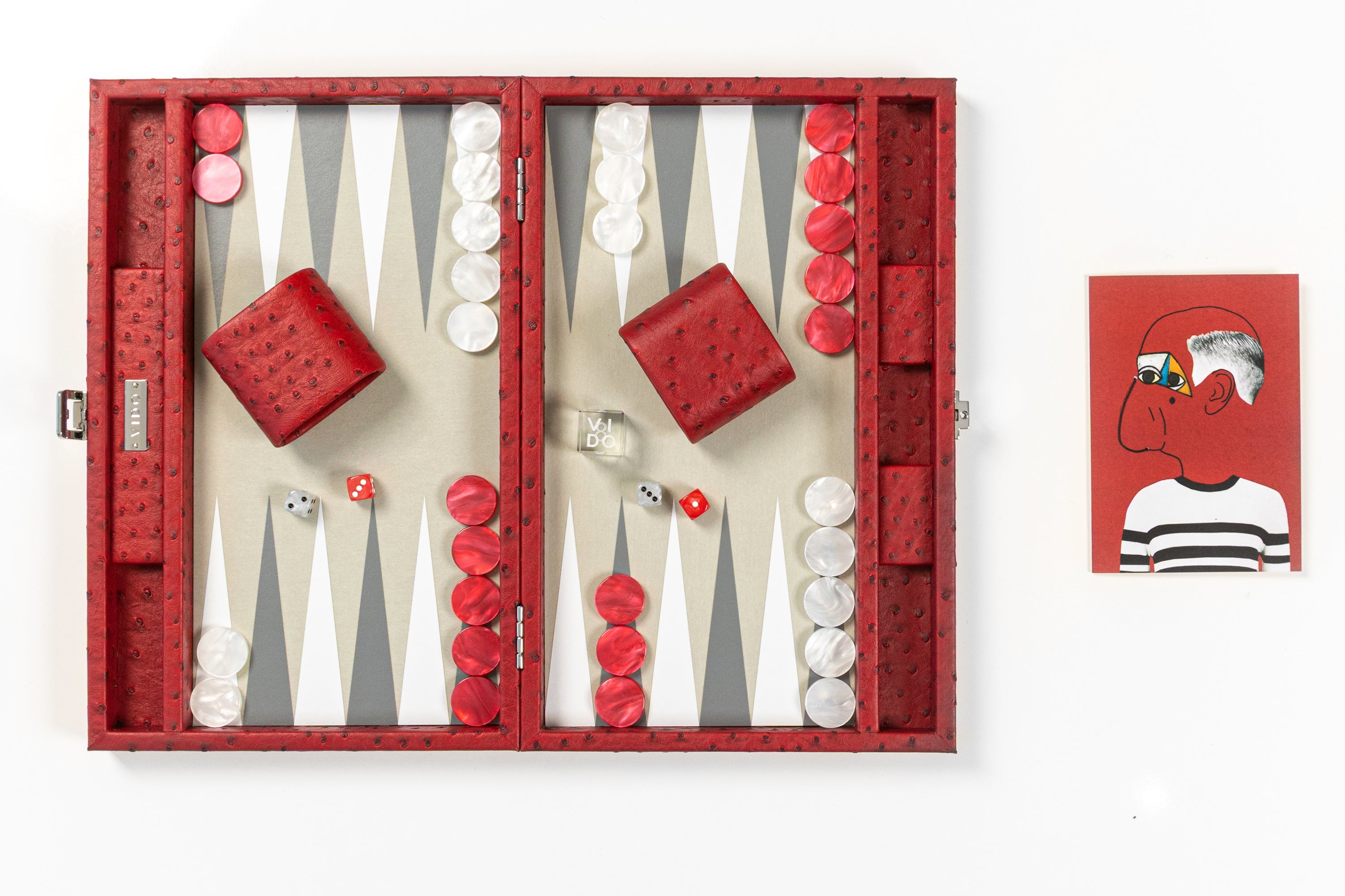 A red backgammon board game set with ostrich skin vegan leather and red and white checkers and dice by VIDO